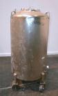 Used DCI Pressure Tank, 150 Gallon, 316L Stainless Steel, Vertical. 30’’ Diameter x 44’’ straight side, dished top and bottom. Internal rated 25 psi at 200 degrees F. Openings: top 12’’ manway with c...