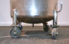 Used DCI Pressure Tank, 150 Gallon, 316L Stainless Steel, Vertical. 30’’ Diameter x 44’’ straight side, dished top and bottom. Internal rated 25 psi at 200 degrees F. Openings: top 12’’ manway with c...