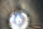 Used DCI Pressure Tank, 150 Gallon, 316L Stainless Steel, Vertical. 30’’ Diameter x 44’’ straight side, dished top and bottom. Internal rated 25 psi at 200 degrees F. Openings: top 12’’ manway with c...