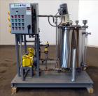 Used EnviroSep Packaged Mixing & Pumping System, Model 2S-MW-CF1. Consists of: (2) Tanks, each approximate 70 gallon, 304 stainless steel, vertical. 24