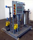 Used EnviroSep Packaged Mixing & Pumping System, Model 2S-MW-CF1. Consists of: (2) Tanks, each approximate 70 gallon, 304 stainless steel, vertical. 24