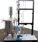 Used Graco Mixing System consisting of: (1) 45 Gallon Stainless Steel Graco Tan