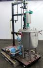 Used Graco Mixing System consisting of: (1) 45 Gallon Stainless Steel Graco Tan