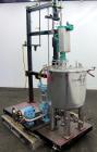 Used- Graco Mixing System consisting of: (1) 45 Gallon Stainless Steel Graco Tan