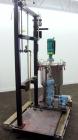 Used Graco Mixing System consisting of: (1) 45 Gallon Stainless Steel Graco Tan