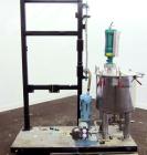 Used- Graco Mixing System consisting of: (1) 45 Gallon Stainless Steel Graco Tan