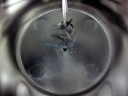 Used Graco Mixing System consisting of: (1) 45 Gallon Stainless Steel Graco Tan