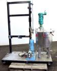 Used- Graco Mixing System consisting of: (1) 45 Gallon Stainless Steel Graco Tan