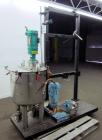 Used Graco Mixing System consisting of: (1) 45 Gallon Stainless Steel Graco Tan