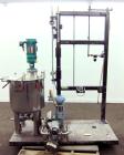 Used- Graco Mixing System consisting of: (1) 45 Gallon Stainless Steel Graco Tan