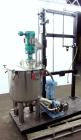 Used Graco Mixing System consisting of: (1) 45 Gallon Stainless Steel Graco Tan