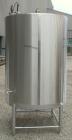 Used Hartel Tank, 400 Gallon, 304 Stainless Steel, Vertical. 45'' Diameter x 60'' straight side. Flat top and bottom. Openings: top 1-1/2'' tri-clamp, 2'' tri-clamp, (2) 3-1/2'' threaded, (2) 3/4'' N...
