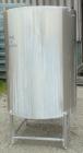 Used Hartel Tank, 400 Gallon, 304 Stainless Steel, Vertical. 45'' Diameter x 60'' straight side. Flat top and bottom. Openings: top 1-1/2'' tri-clamp, 2'' tri-clamp, (2) 3-1/2'' threaded, (2) 3/4'' N...