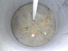Used Hartel Tank, 400 Gallon, 304 Stainless Steel, Vertical. 45'' Diameter x 60'' straight side. Flat top and bottom. Openings: top 1-1/2'' tri-clamp, 2'' tri-clamp, (2) 3-1/2'' threaded, (2) 3/4'' N...