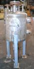 Used Industrial Alloy Fab Pressure Tank, 45 Gallon, 304L Stainless Steel, Vertical. 24 Diameter x 22 straight side, dished top and bottom. Internal rated 35 psi at 400 degrees F. Openings top (2) 1, ...