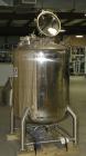 Used Lee Industries Polished Pressure Tank, Model 250DBT, 250 gallon, 316 stainless steel, vertical. 40