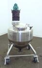 Used Lee Industries Tank,  50 Gallon, Model 50A, 316 Stainless Steel, Vertical. Approximate 30” diameter x 27” deep. Dished top, hemispherical bottom. Off center Lightning Vektor air operated agitato...