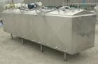Used Mueller Flavor Tank, (4) compartment, approximate 200 gallon each, 304 stainless steel, jacketed.  Each compartment measures 38