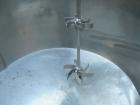 Used Tank, 425 gallon, 316 stainless steel, vertical. Approximately 54