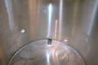 Used Tank, 190 Gallon, 316 Stainless Steel, Vertical. 3/4 Closed top with an “L” shaped opening with cover, sloped bottom. Openings side 2’’ tri-clamp, 3’’ tri-clamp, 1-1/2’’ side bottom outlet. Moun...