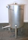 Used Tank, 65 Gallon, 304 Stainless Steel, Vertical. 24-1/2’’ Diameter x 33’’ straight side. Flat open top with a 1 piece cover, sloped bottom. Openings side 1-1/2’’, 1-1/2’’ tri-clamp, 2’’ tri-clamp...