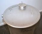 Used Tank, 65 Gallon, 304 Stainless Steel, Vertical. 24-1/2’’ Diameter x 33’’ straight side. Flat open top with a 1 piece cover, sloped bottom. Openings side 1-1/2’’, 1-1/2’’ tri-clamp, 2’’ tri-clamp...