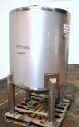 Used Sanitary Stainless Welding Tank, 325 Gallon, 304 Stainless Steel, Vertical. Approximate 44’’ diameter x 48’’ straight side. Flat top, coned bottom. Openings top (2) 1-1/2’’ tri-clamp, 15’’ man w...
