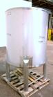 Used Sanitary Stainless Welding Tank, 325 Gallon, 304 Stainless Steel, Vertical. Approximate 44’’ diameter x 48’’ straight side. Flat top, coned bottom. Openings top (2) 1-1/2’’ tri-clamp, 15’’ man w...