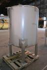 Used Sanitary Stainless Welding Tank, 325 Gallon, 304 Stainless Steel, Vertical. Approximate 44’’ diameter x 48’’ straight side. Flat top, coned bottom. Openings top (2) 1-1/2’’ tri-clamp, 15’’ man w...