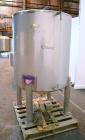 Used Sanitary Stainless Welding Tank, 325 Gallon, 304 Stainless Steel, Vertical. Approximate 44’’ diameter x 48’’ straight side. Flat top, coned bottom. Openings top (2) 1-1/2’’ tri-clamp, 15’’ man w...