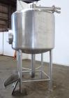 Used Tank, 450 Gallon, 304 Stainless Steel, Vertical. Approximate 60” diameter x 36” straight side, dished top and bottom. Top tangential inlet, top entering spray ball. Side 19” dameter man way with...