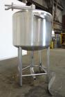 Used Tank, 450 Gallon, 304 Stainless Steel, Vertical. Approximate 60” diameter x 36” straight side, dished top and bottom. Top tangential inlet, top entering spray ball. Side 19” dameter man way with...