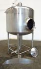Used Tank, 450 Gallon, 304 Stainless Steel, Vertical. Approximate 60” diameter x 36” straight side, dished top and bottom. Top tangential inlet, top entering spray ball. Side 19” dameter man way with...