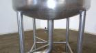 Used Tank, 450 Gallon, 304 Stainless Steel, Vertical. Approximate 60” diameter x 36” straight side, dished top and bottom. Top tangential inlet, top entering spray ball. Side 19” dameter man way with...