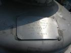 Used Norwalk Pressure Tank, 50 Gallon, Stainless Steel, Vertical. Approximately 24'' diameter x 24'' straight side, dished top and bottom. Internal rated 50 psi at 300 deg F. Top manway, center botto...