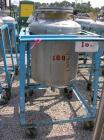 Used Norwalk Pressure Tank, 50 Gallon, Stainless Steel, Vertical. Approximately 24'' diameter x 24'' straight side, dished top and bottom. Internal rated 50 psi at 300 deg F. Top manway, center botto...