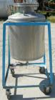 Used O.G. Kelley Co. Pressure Tank, 55 gallon, 304 stainless steel, vertical. 24'' diameter x 27'' straight side, dished top and bottom. Internal rated 50 psi at 300 deg F. Openings: top 10'' with co...