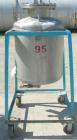 Used O.G. Kelley Co. Pressure Tank, 55 gallon, 304 stainless steel, vertical. 24'' diameter x 27'' straight side, dished top and bottom. Internal rated 50 psi at 300 deg F. Openings: top 10'' with co...