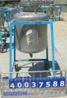 Used O.G. Kelley Co. Pressure Tank, 55 gallon, 304 stainless steel, vertical. 24'' diameter x 27'' straight side, dished top and bottom. Internal rated 50 psi at 300 deg F. Openings: top 10'' with co...