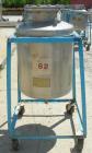 Used O.G. Kelley Co. Pressure Tank, 55 gallon, 304 stainless steel, vertical. 24'' diameter x 27'' straight side, dished top and bottom. Internal rated 50 psi at 300 deg F. Openings: top 10'' with co...