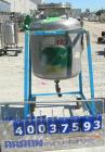 Used O.G. Kelley Co. Pressure Tank, 55 gallon, 304 stainless steel, vertical. 24'' diameter x 27'' straight side, dished top and bottom. Internal rated 50 psi at 300 deg F. Openings: top 10'' with co...