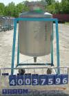 Used O.G. Kelley Co. Pressure Tank, 55 gallon, 304 stainless steel, vertical. 24'' diameter x 27'' straight side, dished top and bottom. Internal rated 50 psi at 300 deg F. Openings: top 10'' with co...