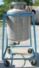 Used O.G. Kelley Co. Pressure Tank, 55 gallon, 304 stainless steel, vertical. 24'' diameter x 27'' straight side, dished top and bottom. Internal rated 50 psi at 300 degrees F. Openings: top 10'' wit...