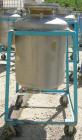 Used O.G. Kelley Co. Pressure Tank, 55 gallon, 304 stainless steel, vertical. 24'' diameter x 27'' straight side, dished top and bottom. Internal rated 50 psi at 300 deg F. Openings: top 10'' with co...