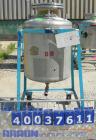Used O.G. Kelley Co. Pressure Tank, 55 gallon, 304 stainless steel, vertical. 24'' diameter x 27'' straight side, dished top and bottom. Internal rated 50 psi at 300 deg F. Openings: top 10'' with co...