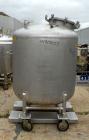 Used Mueller Tank, 275 Gallon, Model F, 316 Stainless Steel, Vertical. 46’’ diameter x 36’’ straight side, dish top and bottom. Internal rated to 15 psi. Openings: top (2) 2’’ NPT, 18’’ manway, no co...