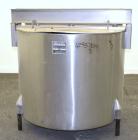 Used Perma-San Tank, 200 Gallon, Model KTL, 304 Stainless Steel, Vertical. 44’’ Diameter x 29’’ straight side. Open top with (2) 1/3 covers, coned bottom. Bolt on agitator bridge. 2’’ Tri-clamp cente...