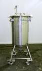 Used Precision Stainless Tank, 200 Liter (52.8 Gallon), 316L Stainless Steel, Vertical. 22’’ Diameter x 33’’ straight side. Flat open top with a 1 piece cover with a 1/3 hinged cover, dished bottom. ...