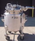 Used Walker Stainless Pressure Tank, 52.8 gallon (200 liter), 316L stainless steel, vertical. 30'' diameter x 18'' straight side, dished top and bottom. Polished Internal rated full vacuum and 35 psi...