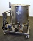 Used Walker Stainless Tank, 80 Gallon, 316 Stainless Steel, Vertical. 30” Diameter x 29” straight side. Open top with a 2 piece cover, coned bottom. Provision for a clamp-on agitator. 1-1/2” Tri-clam...